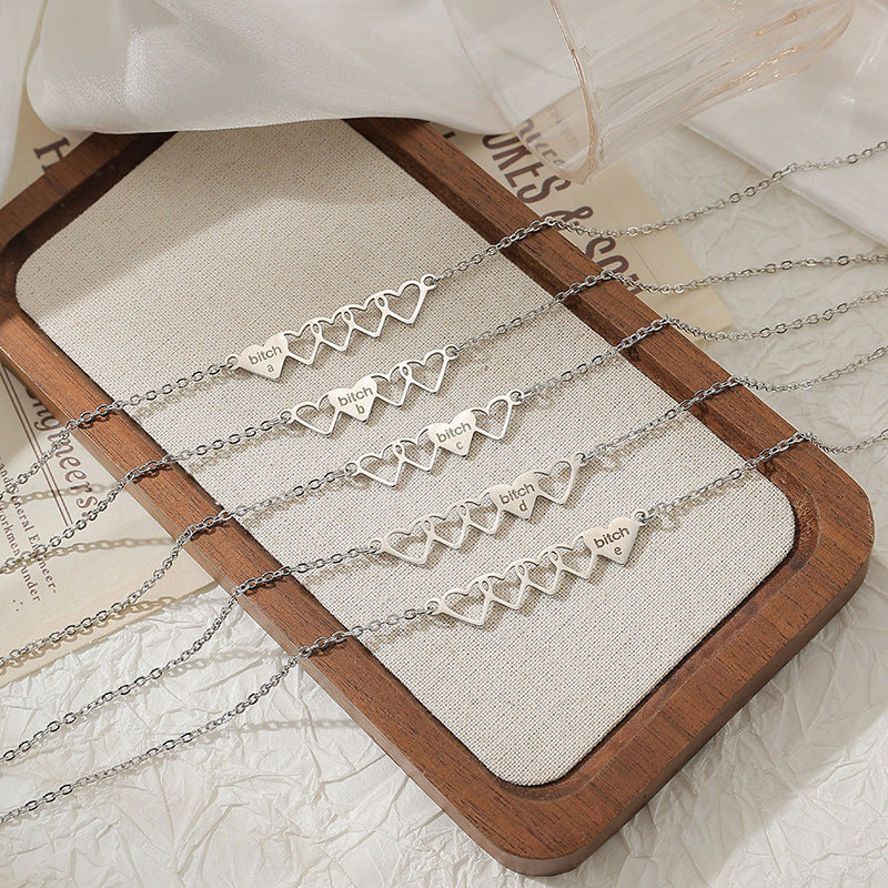 Wholesale Stainless steel heart necklace with letters