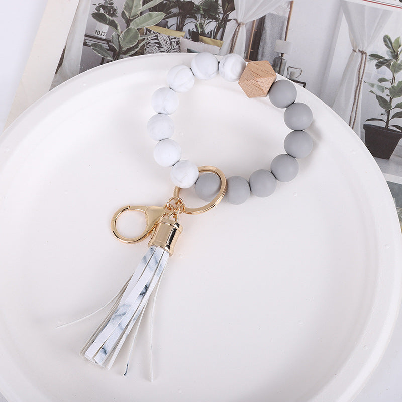 Wholesale Trendy Silicone Bead Bracelet With Tassel Wooden Bead Keychain Natural Geometry Style Chic Jewelry Accessory Gift