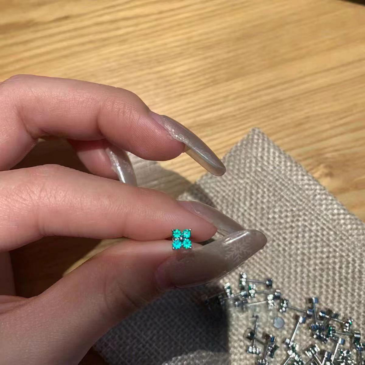 Wholesale Mini Four-Leaf Clover Ear Bone Nail Titanium Steel Earrings