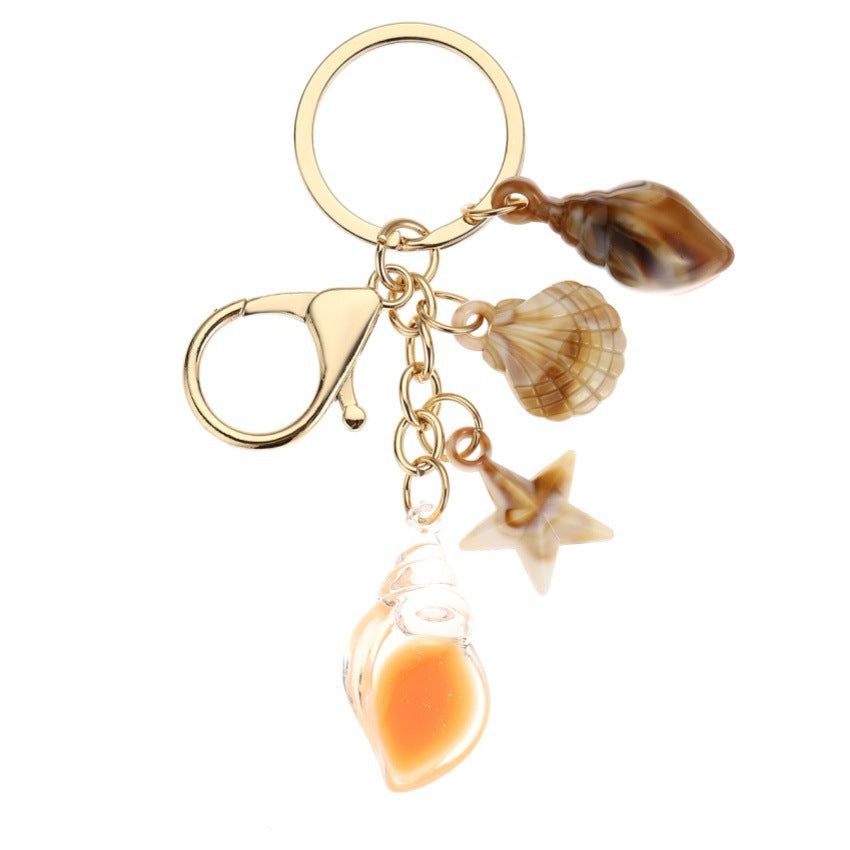 Wholesale Luminous Resin Starfish Crystal Conch Keychain Pendant for Women Car Bag Decoration - Boutique Resale