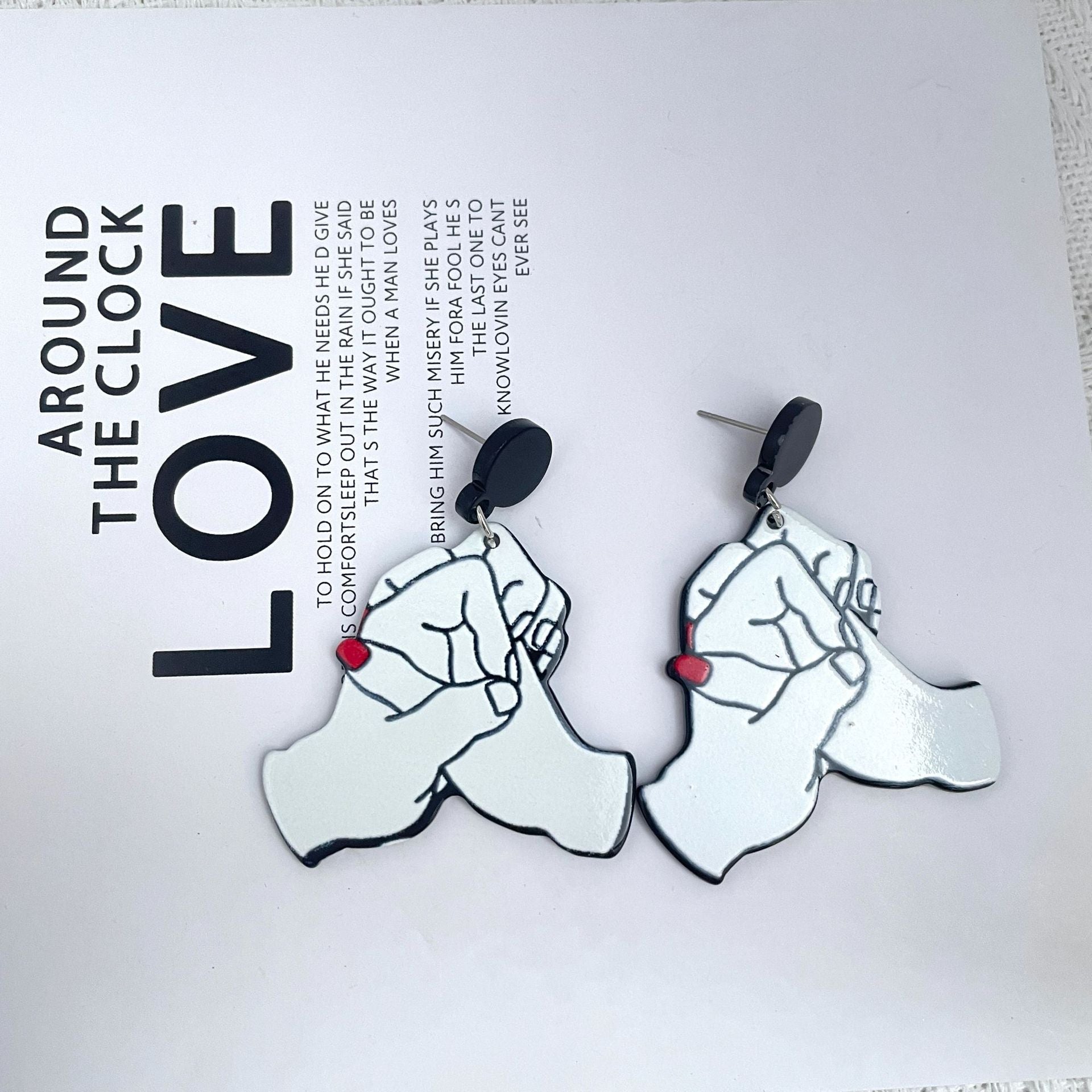 Wholesale acrylic ten-finger buckle hand in hand Valentine's Day earrings