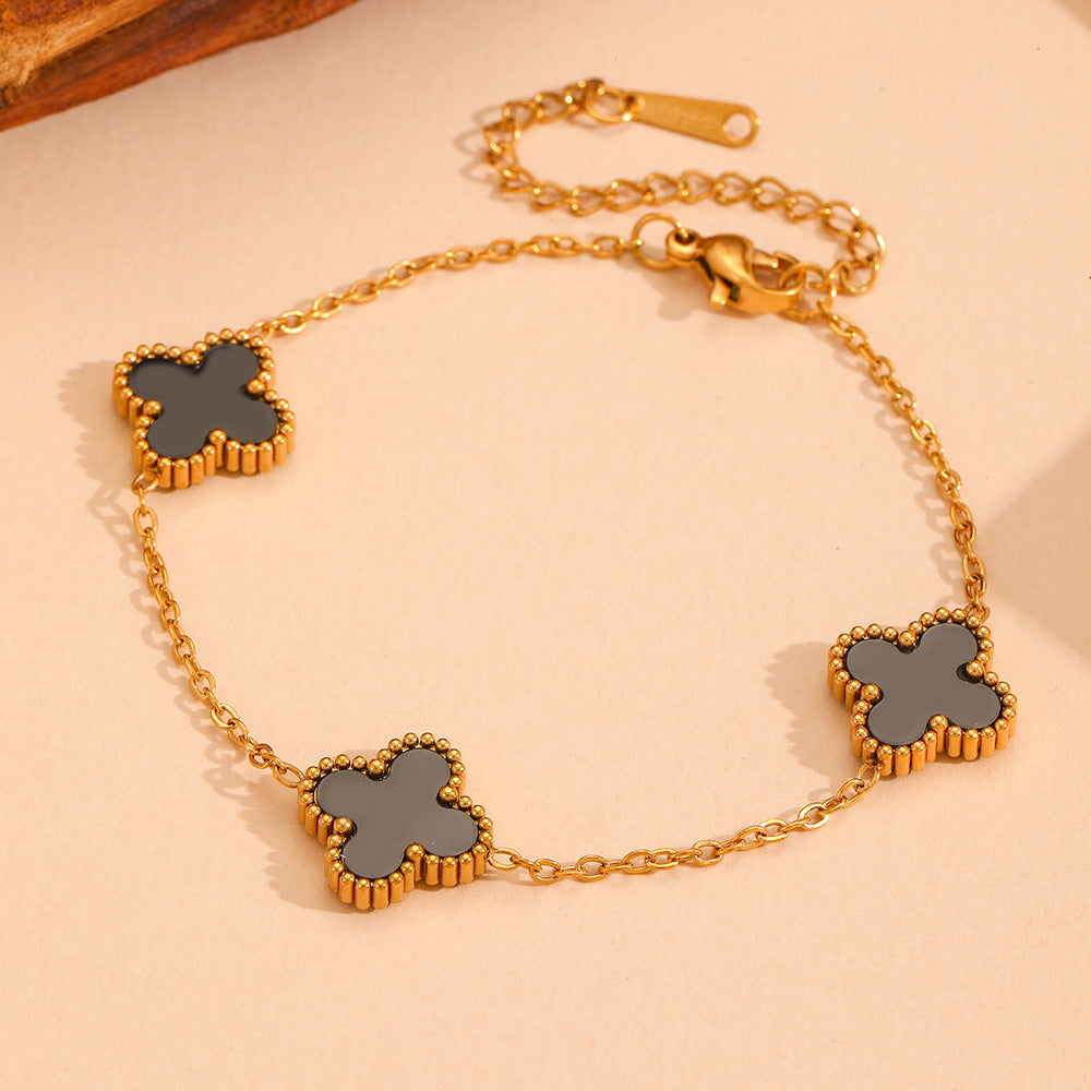 Wholesale Fashion stainless steel three four-leaf flower jewelry new titanium steel does not fade small flower jewelry suit