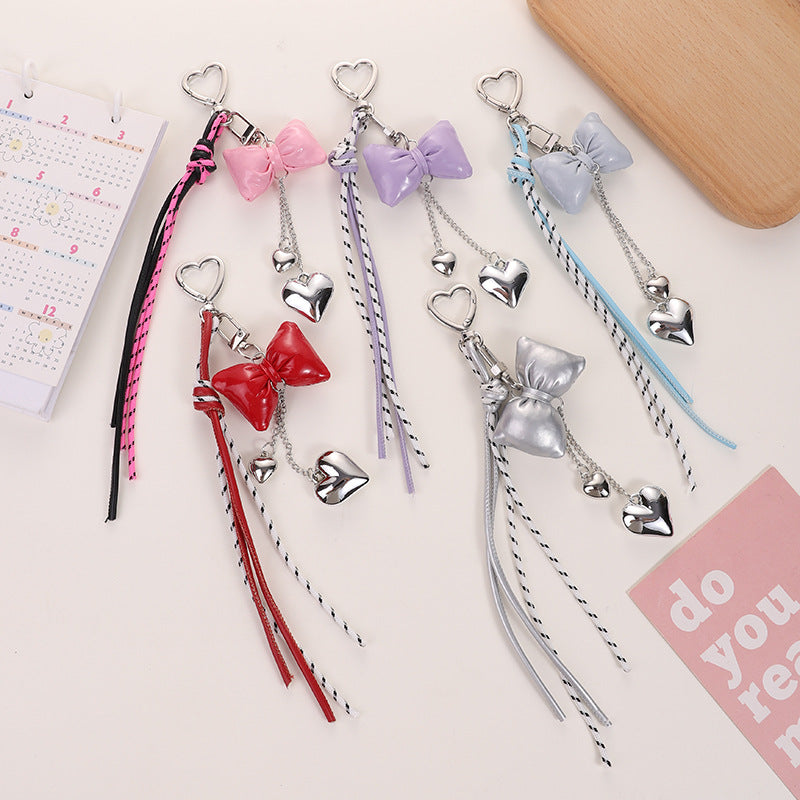 Wholesale Leather cord bow tassel keychain