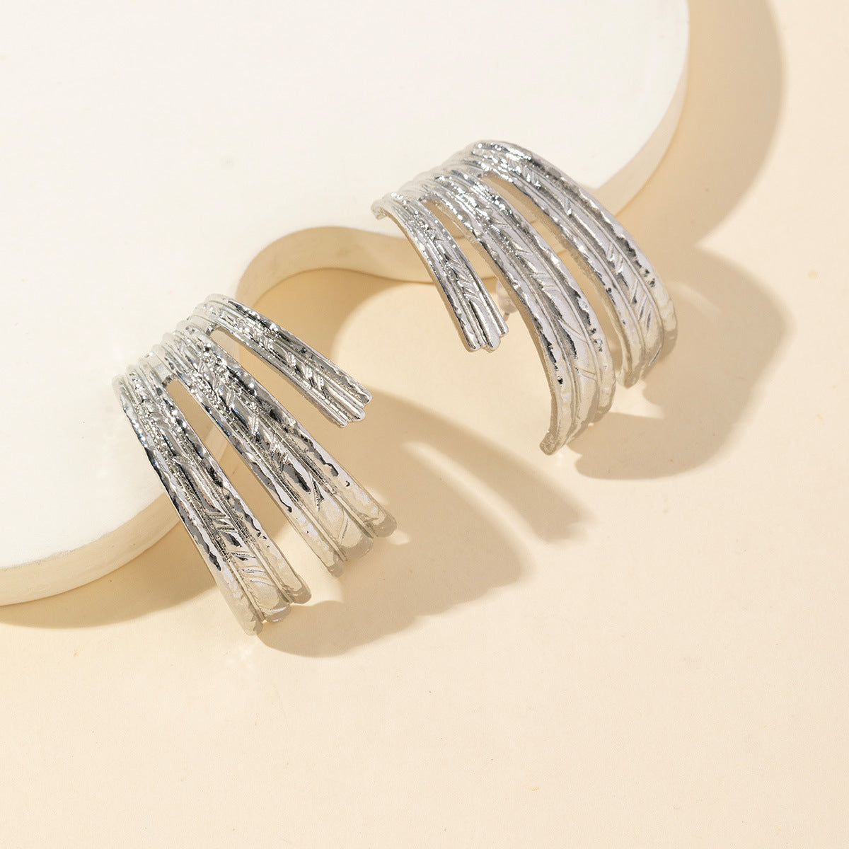 Wholesale metal pleated earrings exaggerated irregular geometric C- shaped stripe earrings