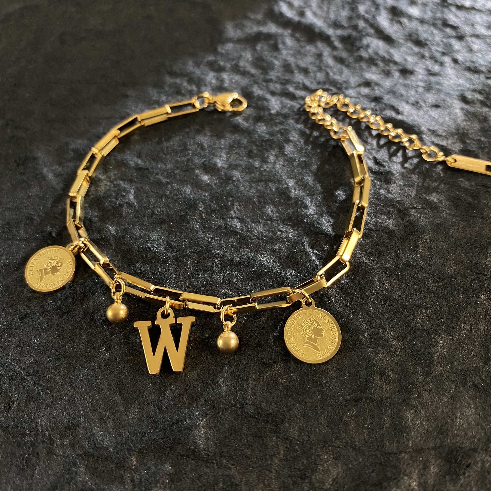 Wholesale Titanium Steel 18K Gold Plated Queen's Head Letter Bracelet ACC-BT-YuXun007