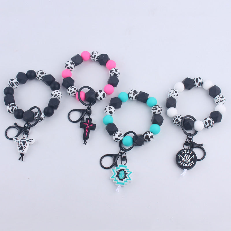 Wholesale Cartoon Bull Head Aztec Cross Silicone Beaded Wrist Keychain