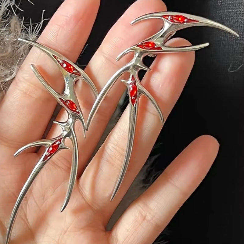 Wholesale Red Thorn Devil's Eye Alien Ear Clip Earrings