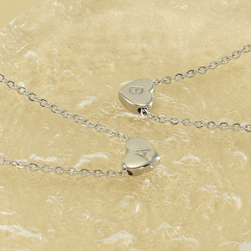 Wholesale titanium steel love letter necklace