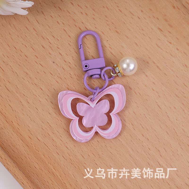Wholesale Acrylic colorful hollow butterfly pearl pendant keychain