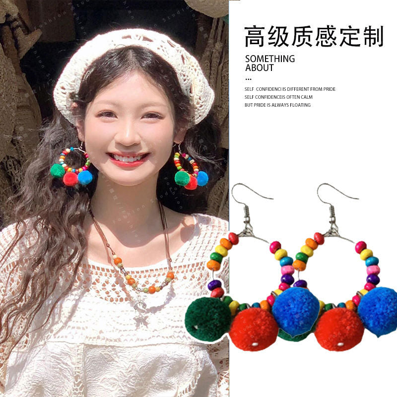 Wholesale long colorful pompom earrings