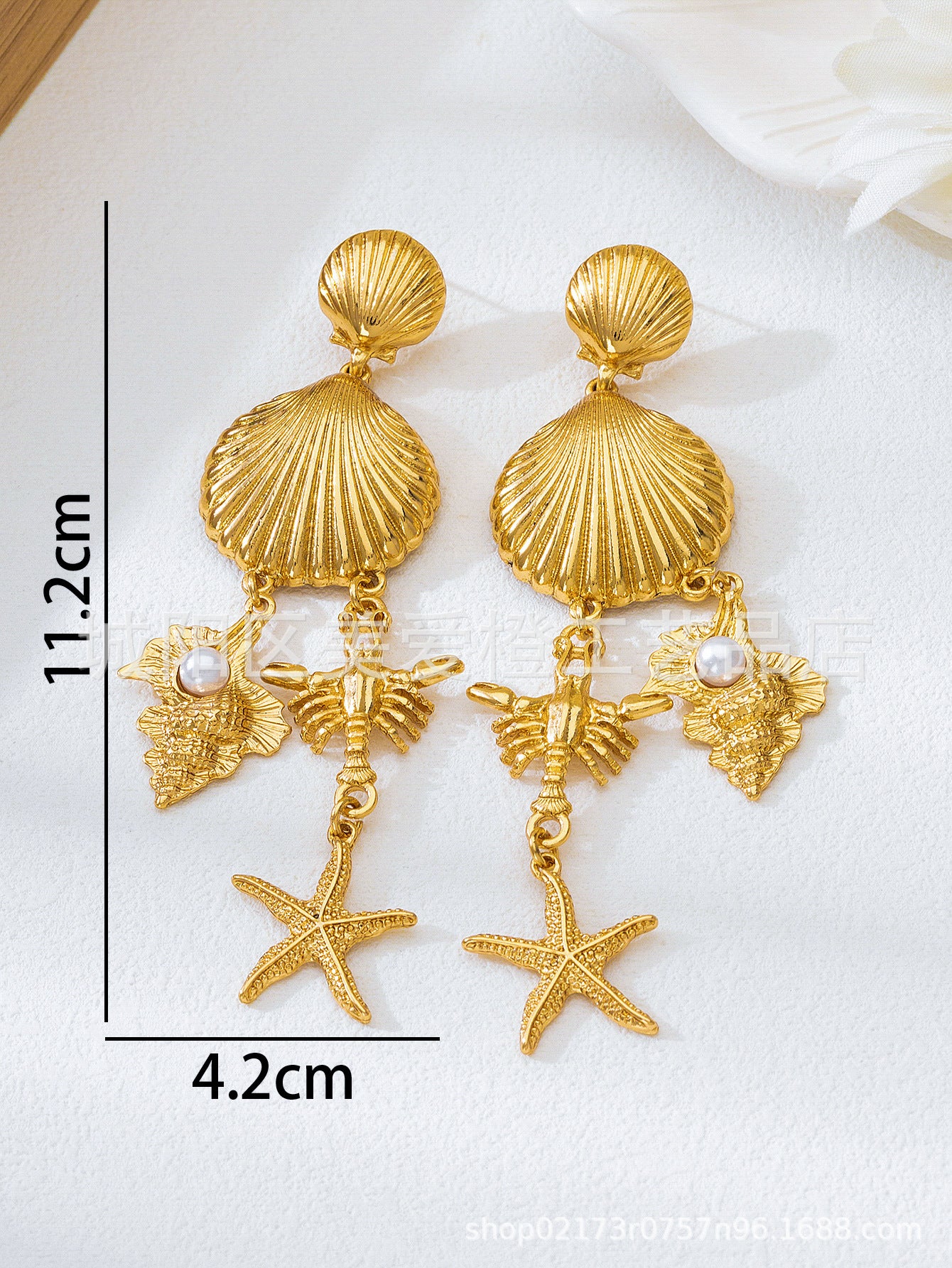 Wholesale Ocean-themed alloy earrings jewelry pendants light luxury and high-end gold color