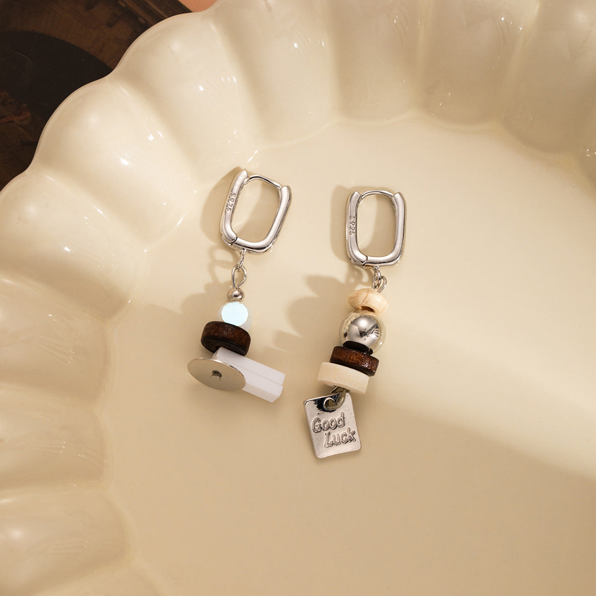 Wholesale silver needle stacked asymmetrical earrings