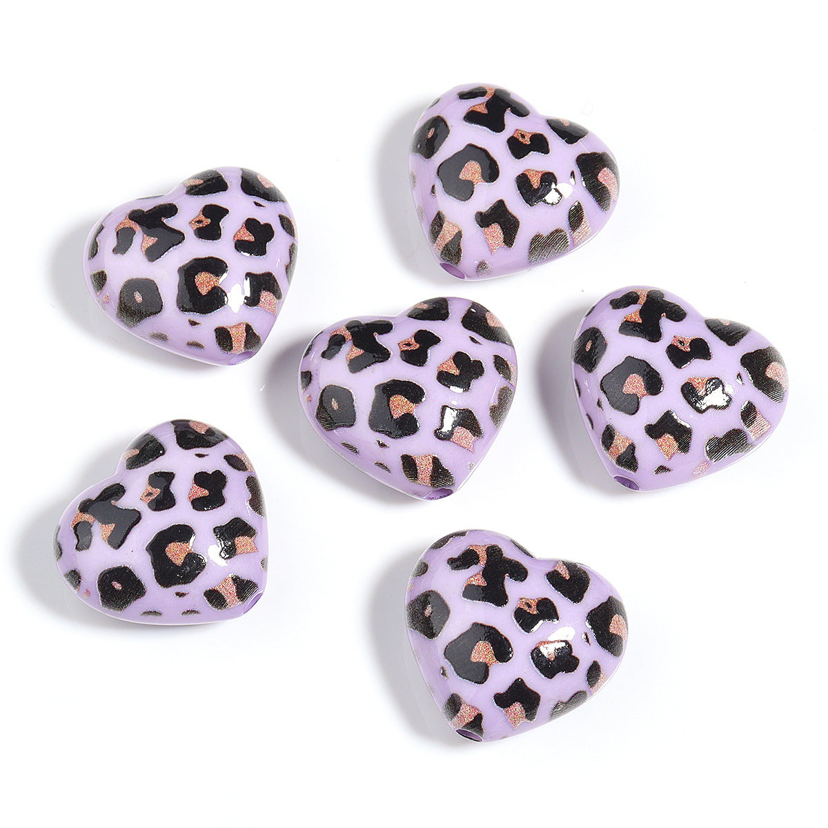 Wholesale 5pcs Acrylic Beads of colorful leopard print heart-shaped acrylic beads for DIY crafts.