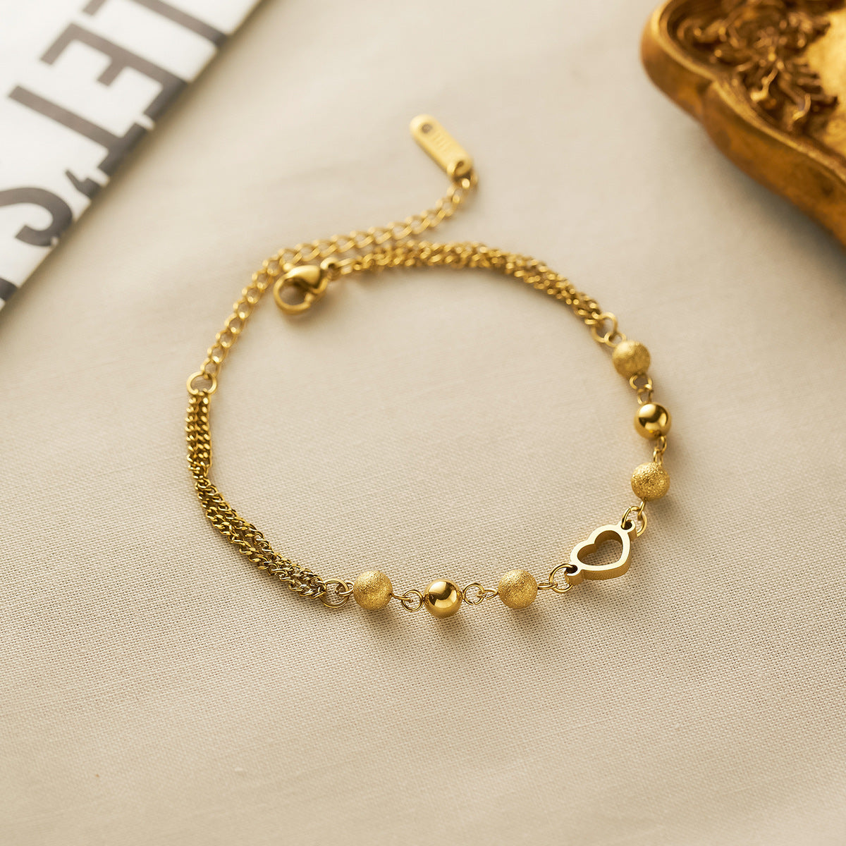 Wholesale Women's hollow heart titanium steel bracelet