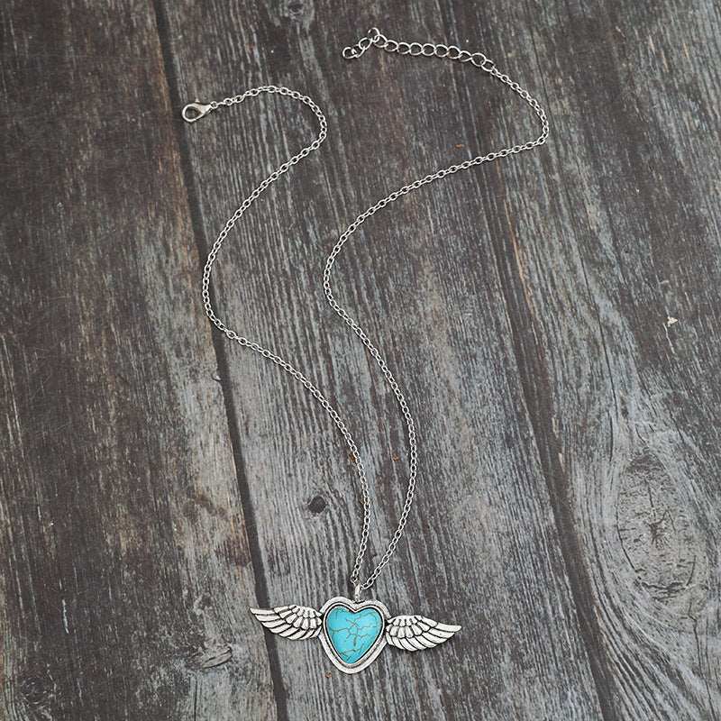 Wholesale Bohemian Gothic Heart Turquoise Wings Alloy Pendant Necklace Fashion Accessory