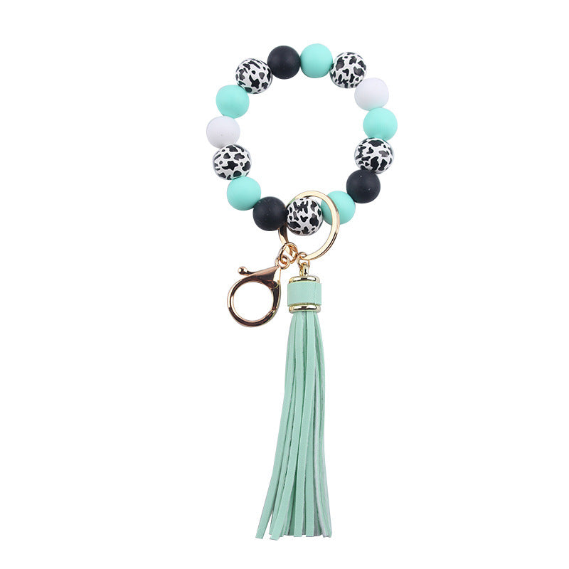 Wholesale leather PU tassel silicone beads wooden beads DIY  bracelet keychain