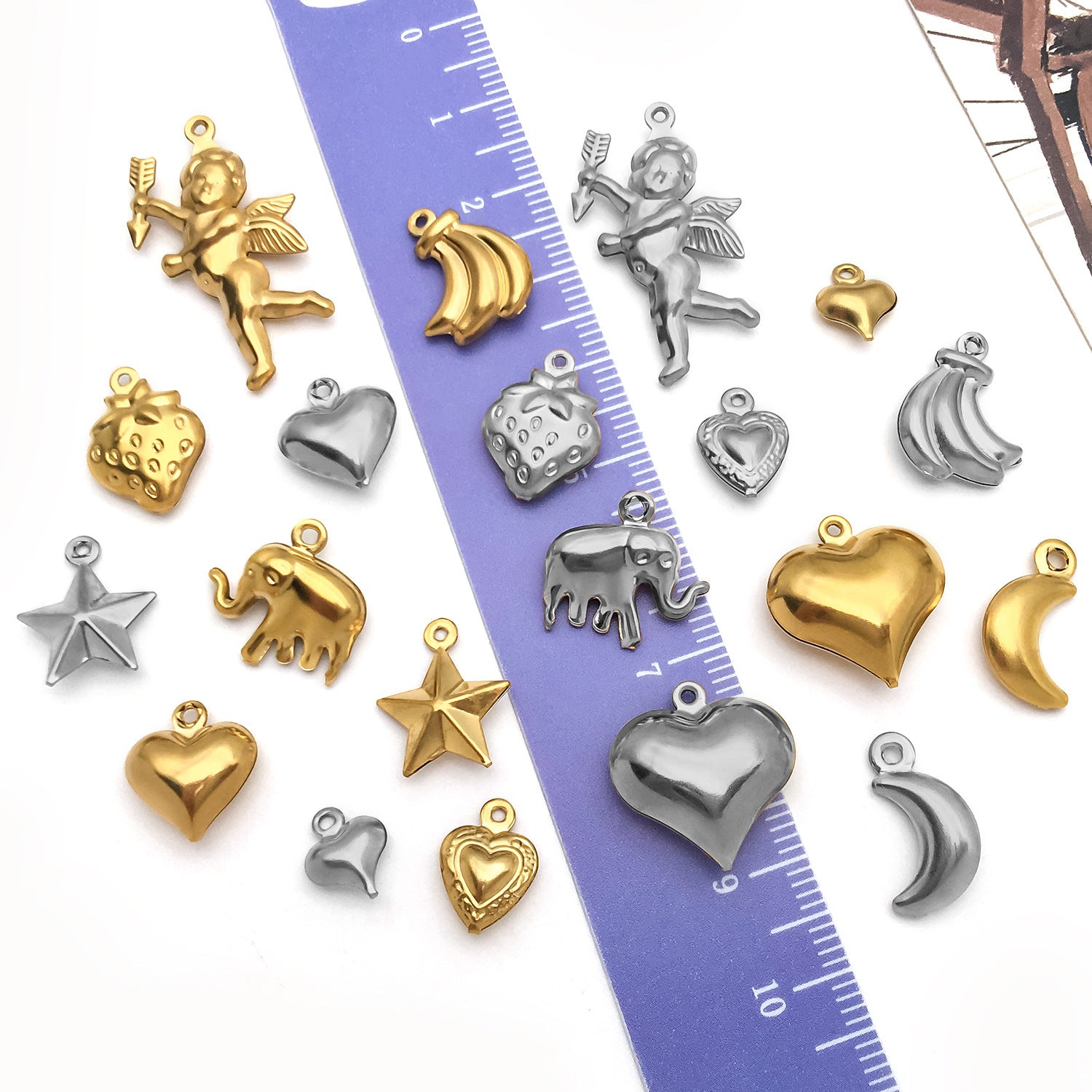 Wholesale Stainless steel vacuum plated hollow angel heart fruit  Charms