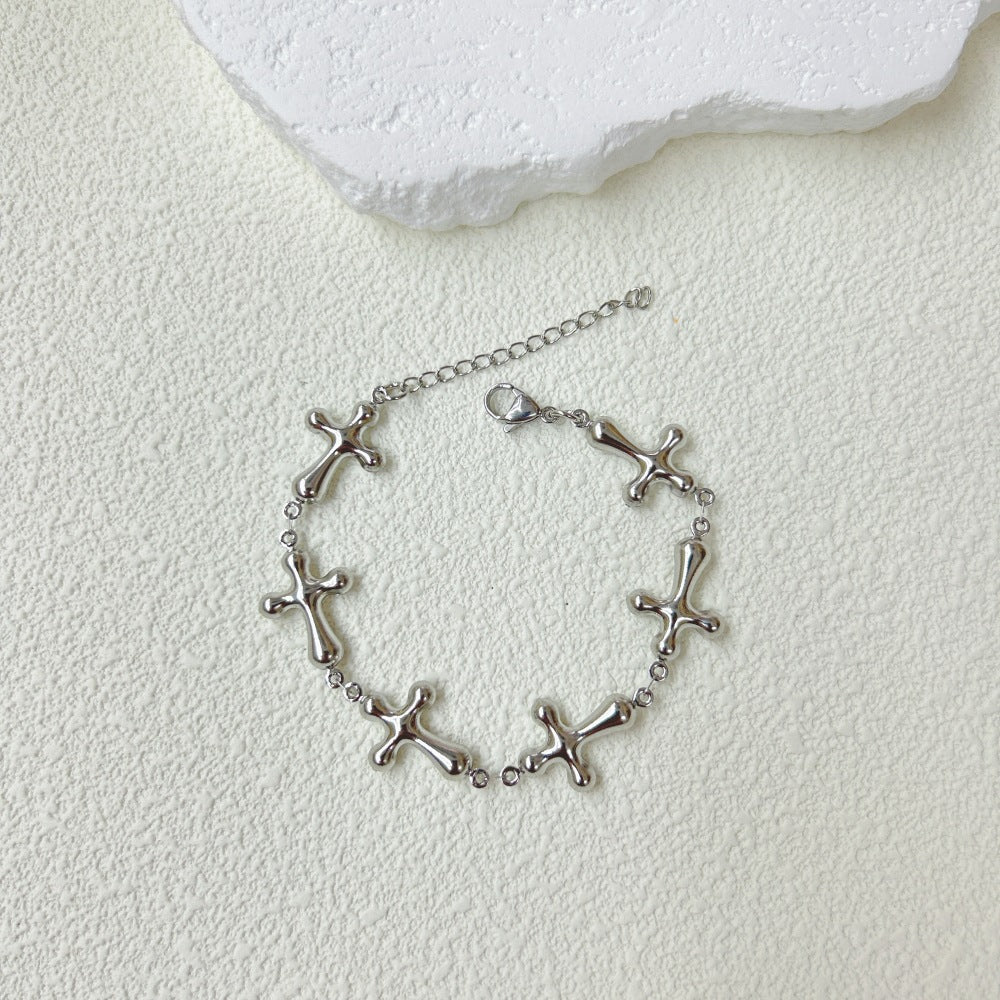 Wholesale  light luxury stainless steel three-dimensional hollow cross bracelet necklace suit