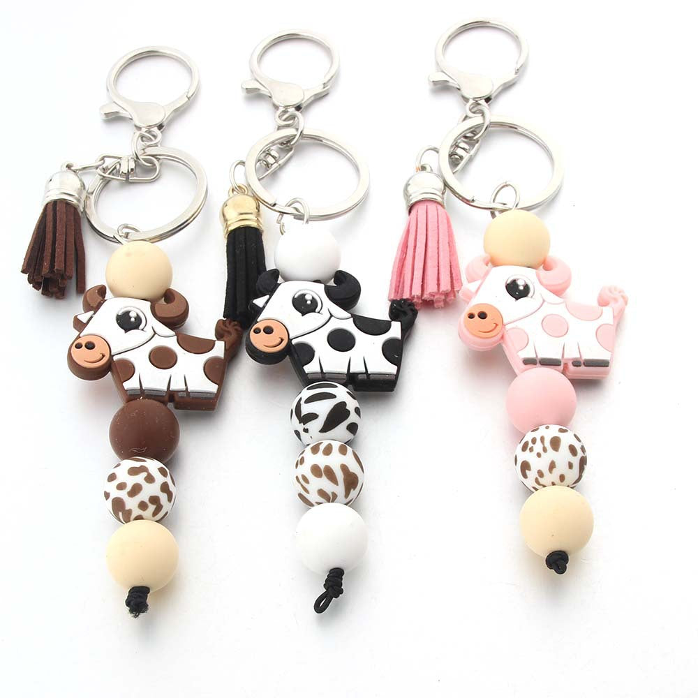 Cartoon cow silicone beaded keychains from AccsWholesale