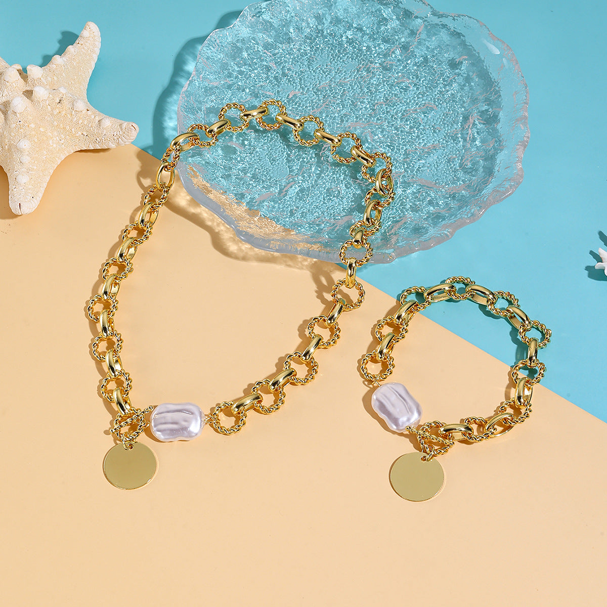 Wholesale  best-selling trendy pearl heart necklace and bracelet set for women  featuring a luxurious and sophisticated ocean-themed design