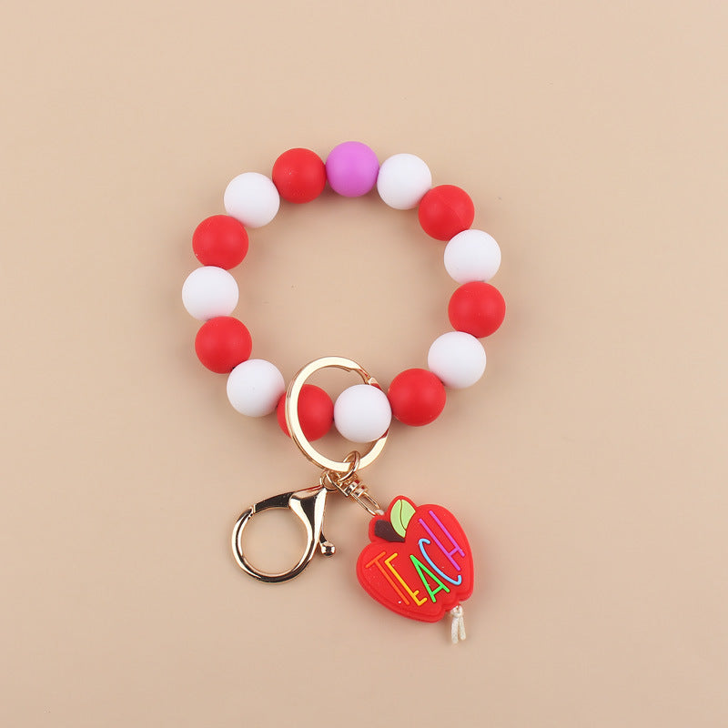 Wholesale Cartoon Apple Teacher Pencil Silicone Beaded Wrist Keychain