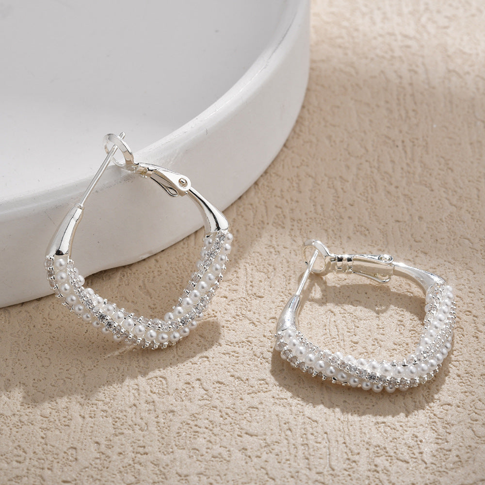 Wholesale Pearl inlaid with diamond twisted circular hoop earrings