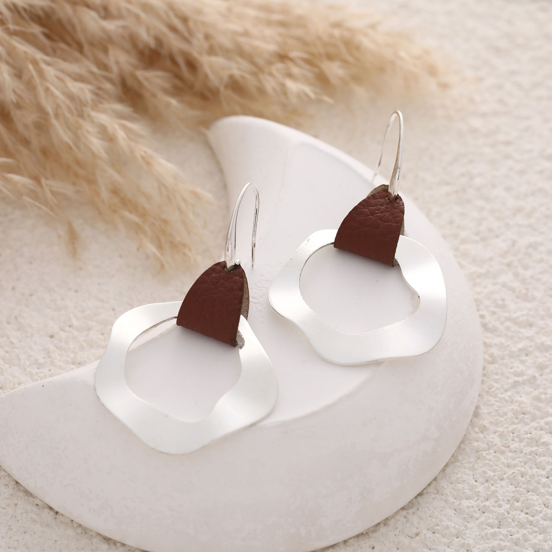 Wholesale  artificial leather irregular female alloy earrings