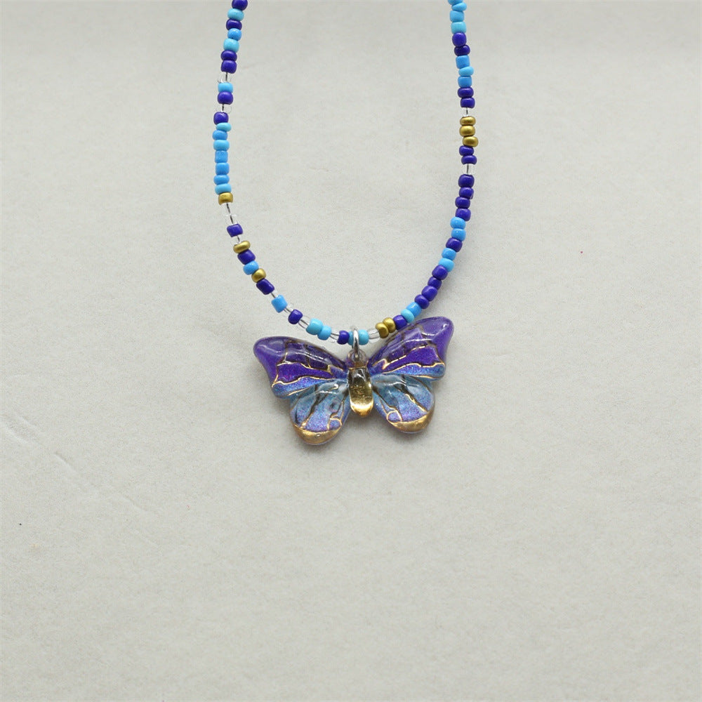 Wholesale gradient color bronzing butterfly sweet pendant rice beads beaded necklace