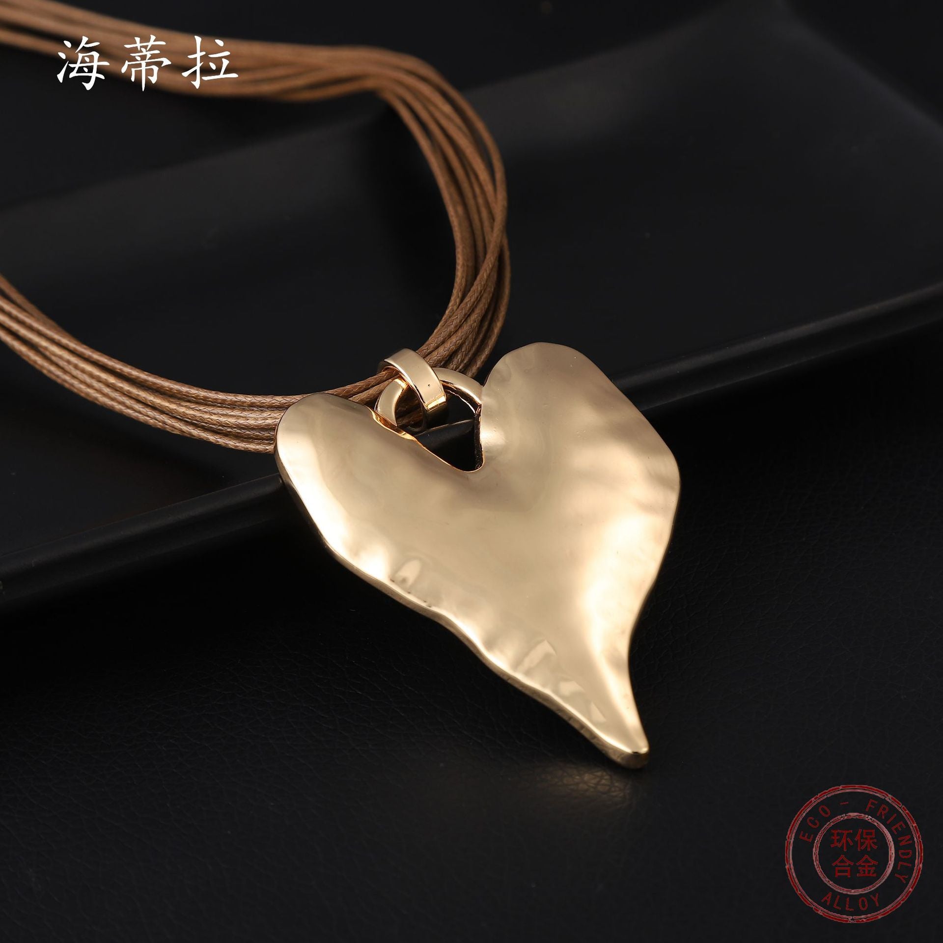 Wholesale golden three-dimensional heart-shaped leather rope pendant irregular heart-shaped necklace