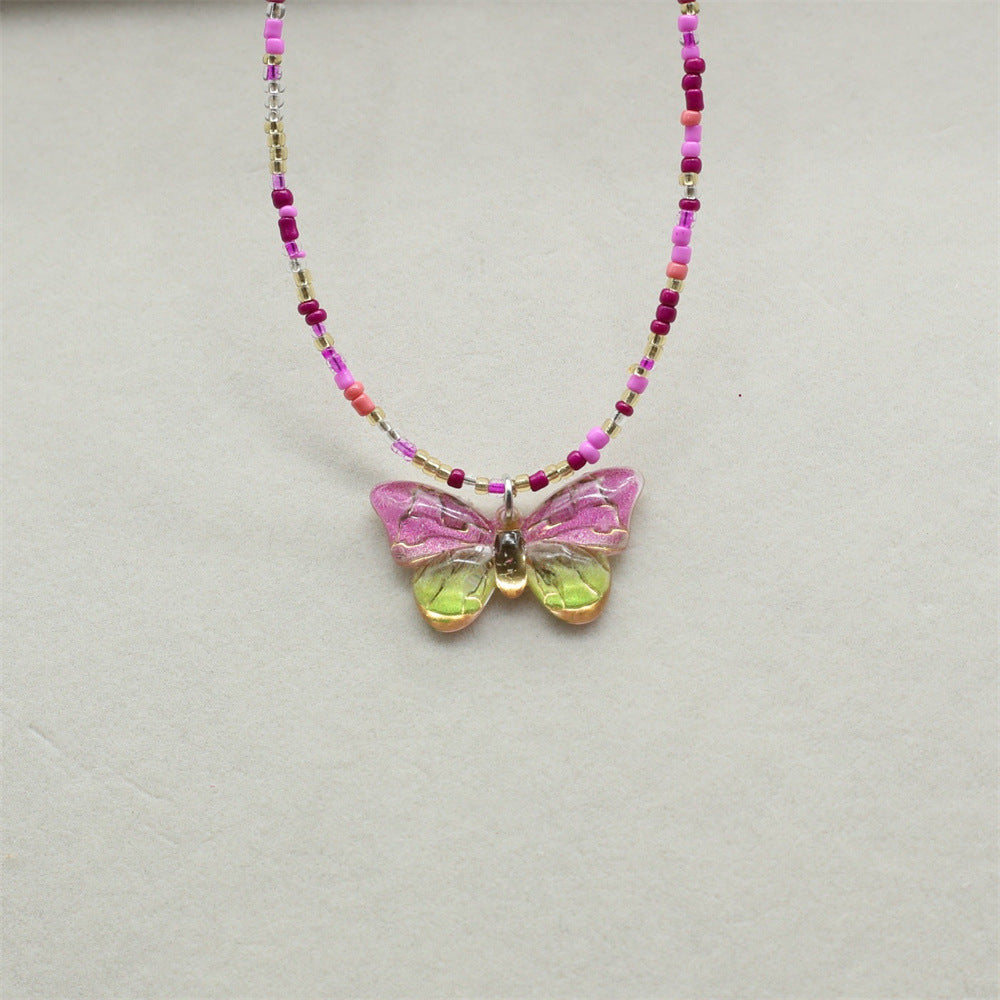 Wholesale gradient color bronzing butterfly sweet pendant rice beads beaded necklace