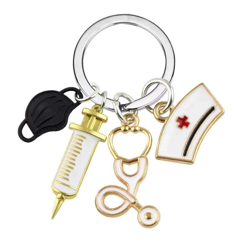 Wholesale Metal Nurse Medical Keychain Pink Stethoscope Cross Design Gift Bag Charm Decorative Accessory
