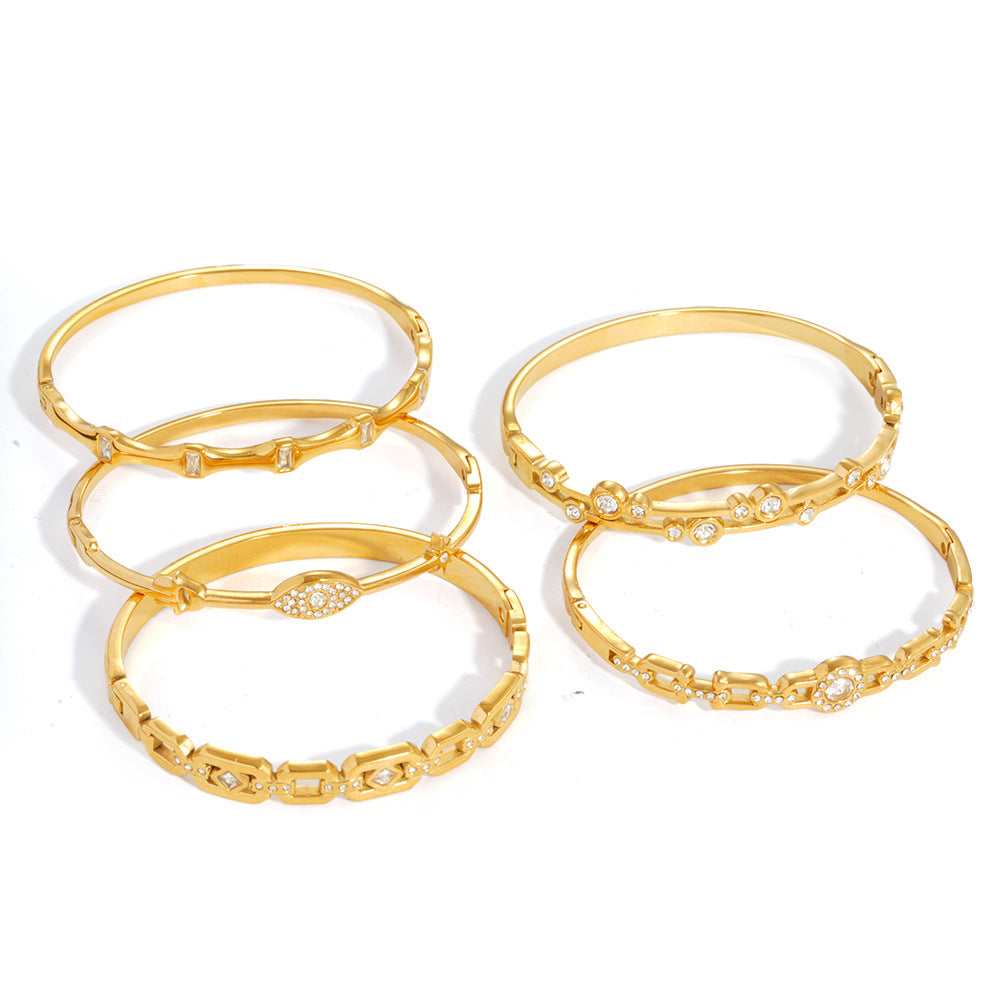 Wholesale Titanium Steel Geometric Starburst Bangle with Inlaid Diamonds