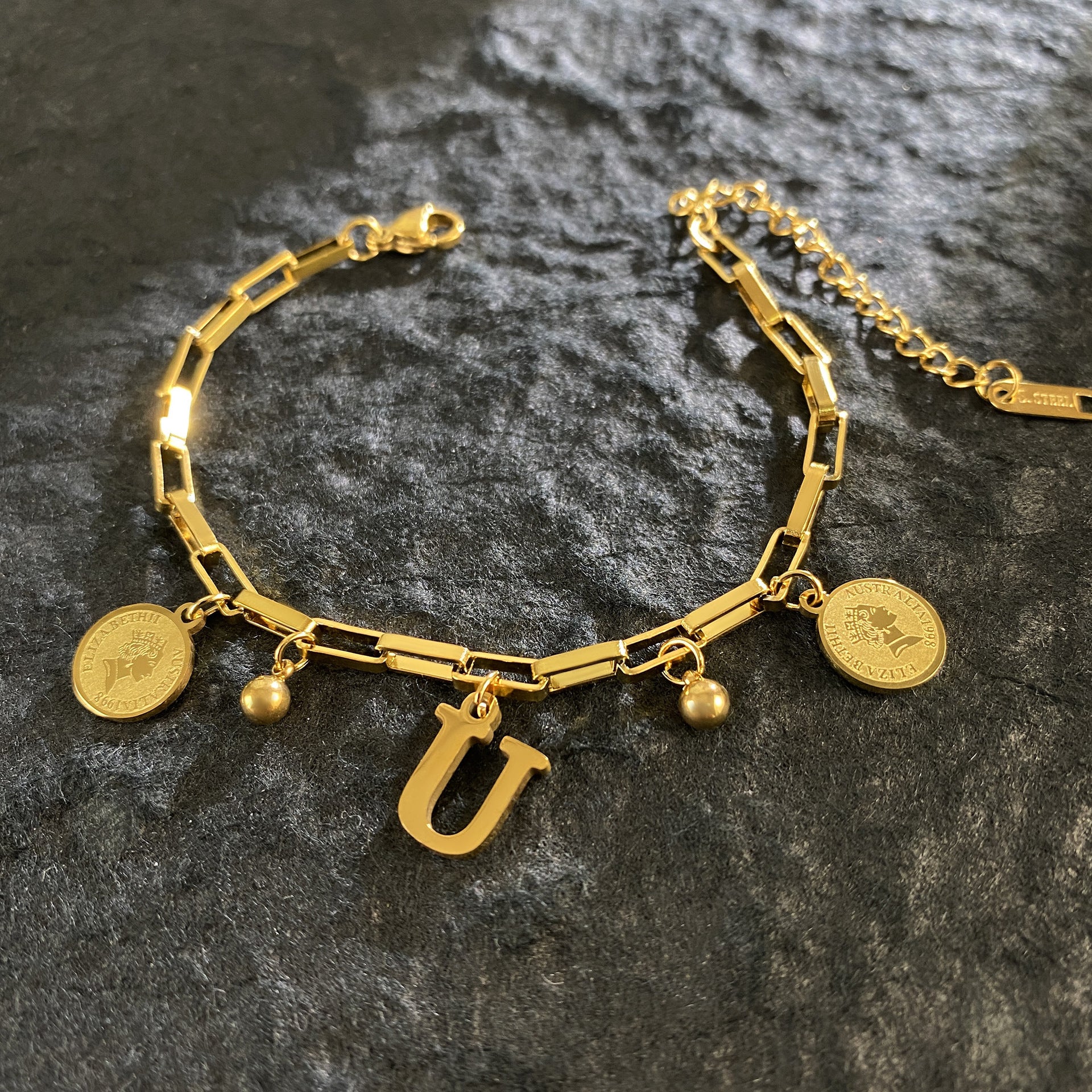 Wholesale Titanium Steel 18K Gold Plated Queen's Head Letter Bracelet ACC-BT-YuXun007