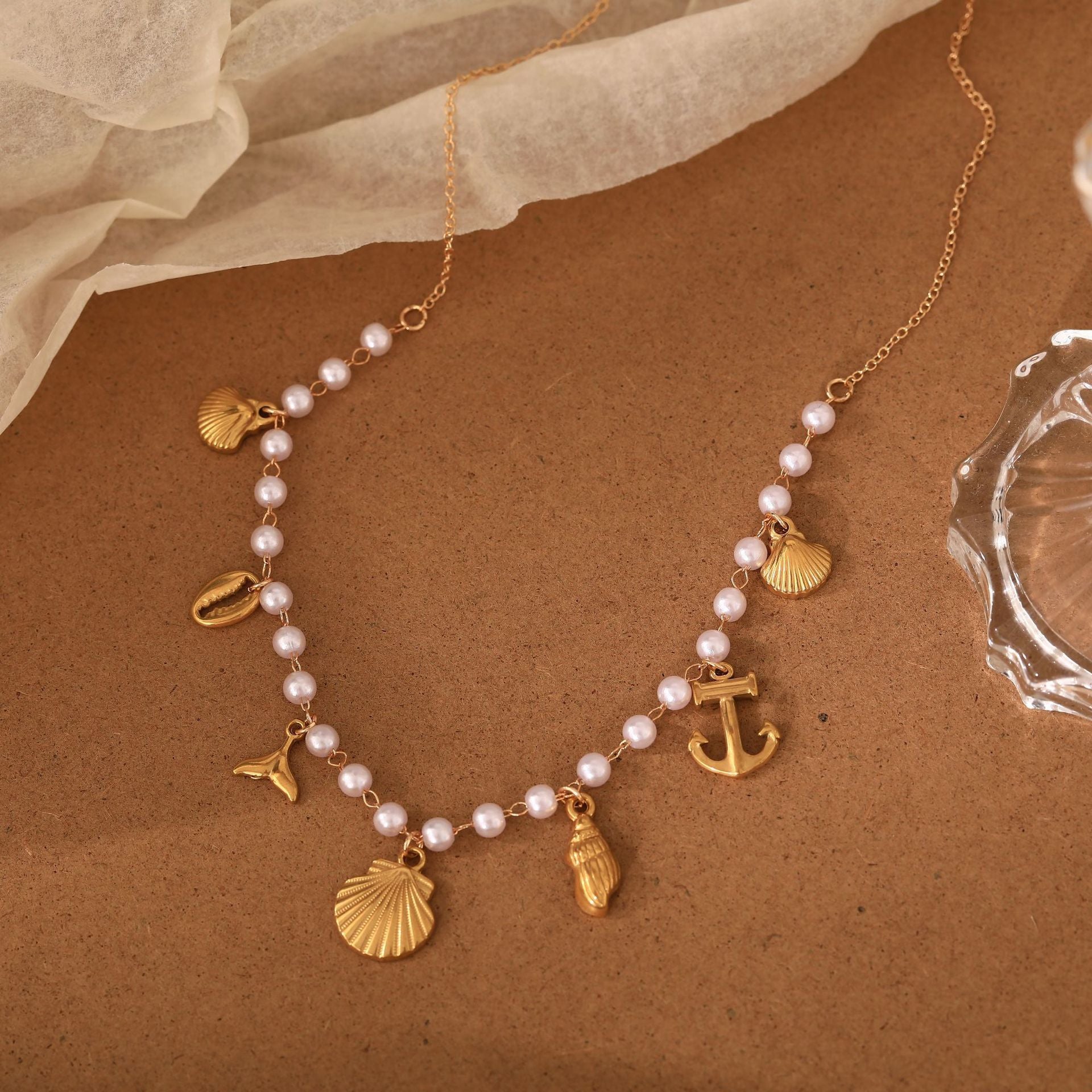 Wholesale Stainless steel fish tail,  seashell,  conch,  and anchor pendant necklace