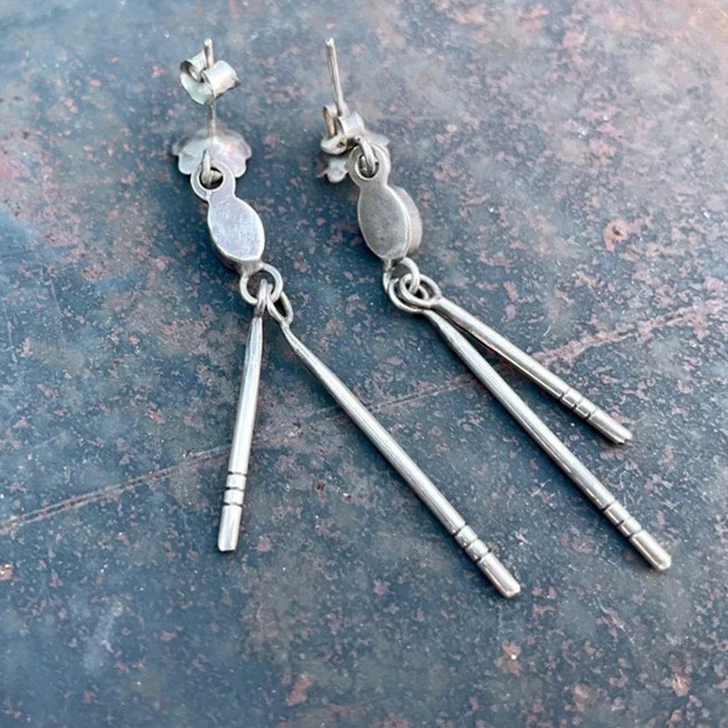 Wholesale Bohemian style carved pine stone long earrings