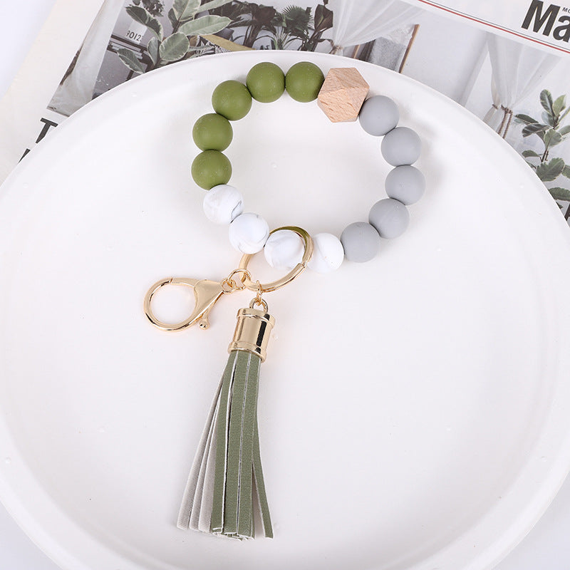 Wholesale Trendy Silicone Bead Bracelet With Tassel Wooden Bead Keychain Natural Geometry Style Chic Jewelry Accessory Gift