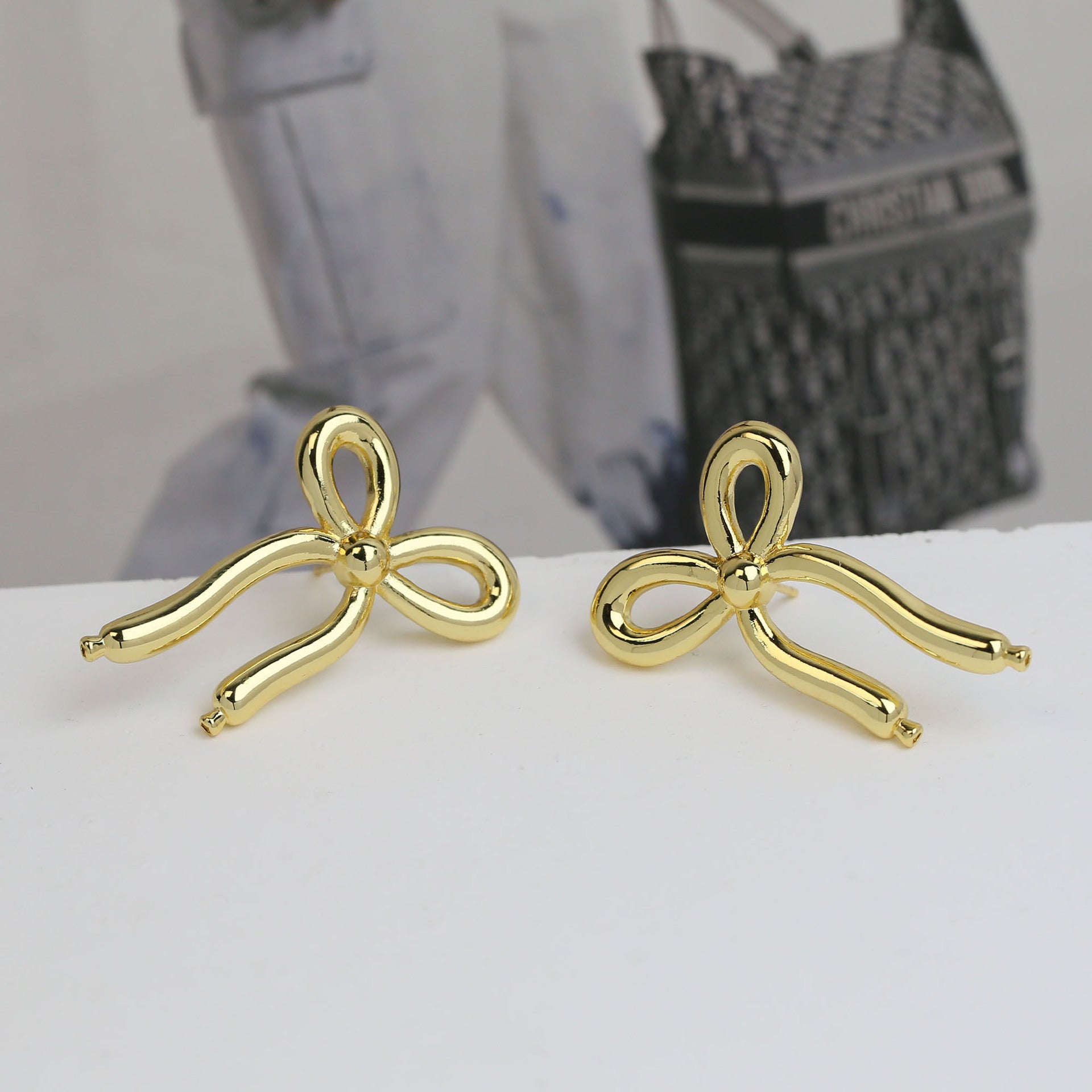 Wholesale  18K gold bow bubble brass earrings