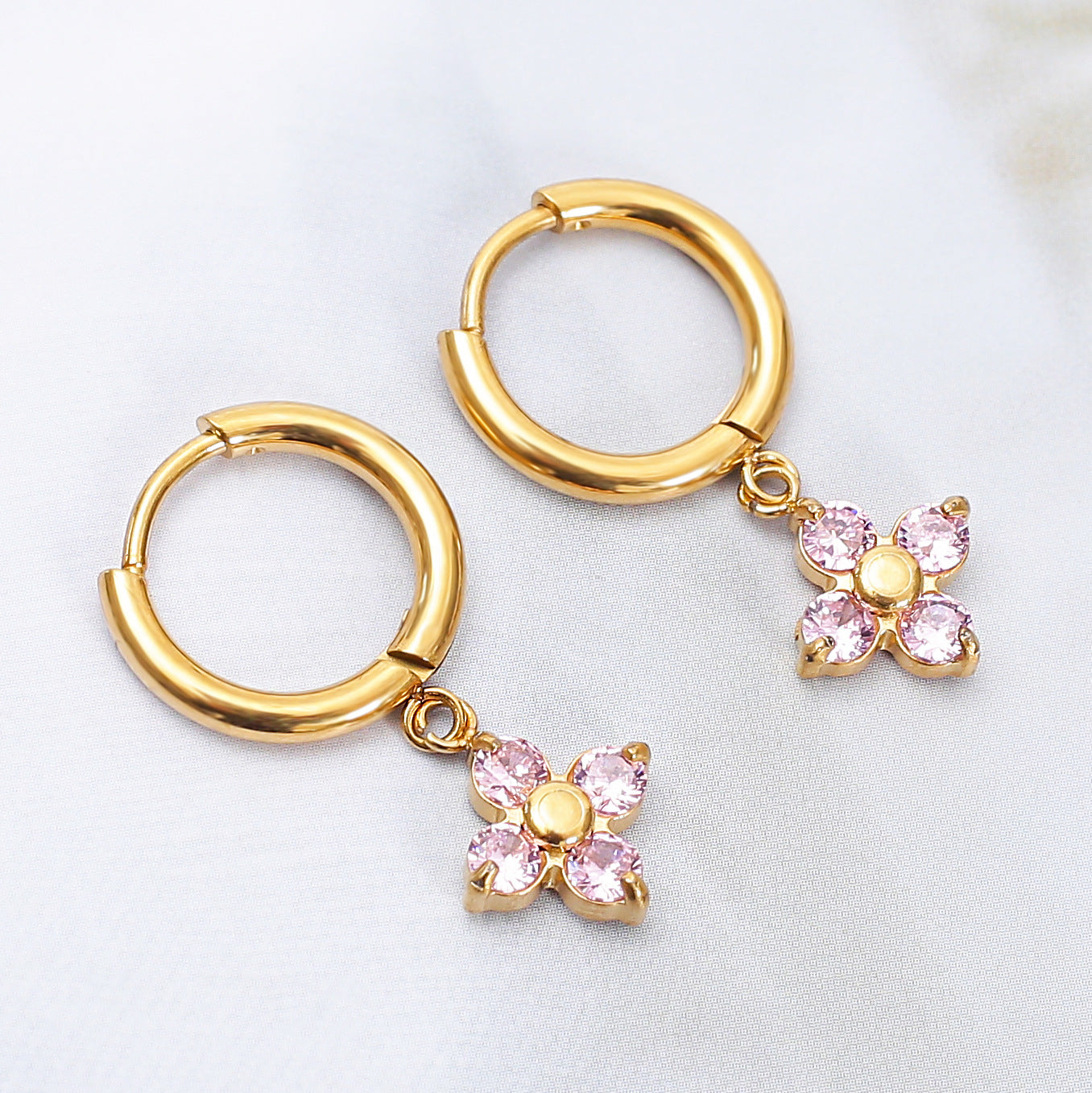Wholesale Stainless steel flower earrings with zircon inlay