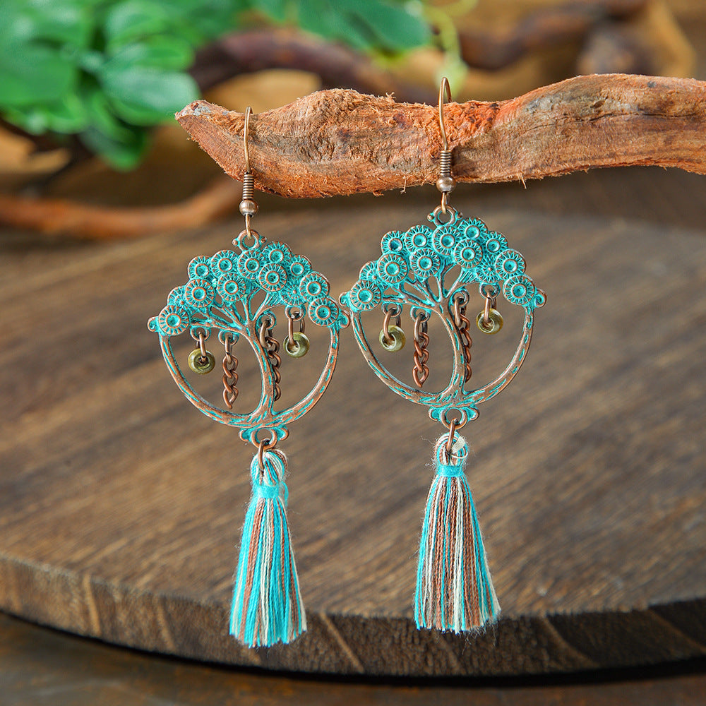 Wholesale Retro Bohemian Turquoise Heart Hollow Leaves Alloy Earrings for Party Wear Boutique Resale Jewelry