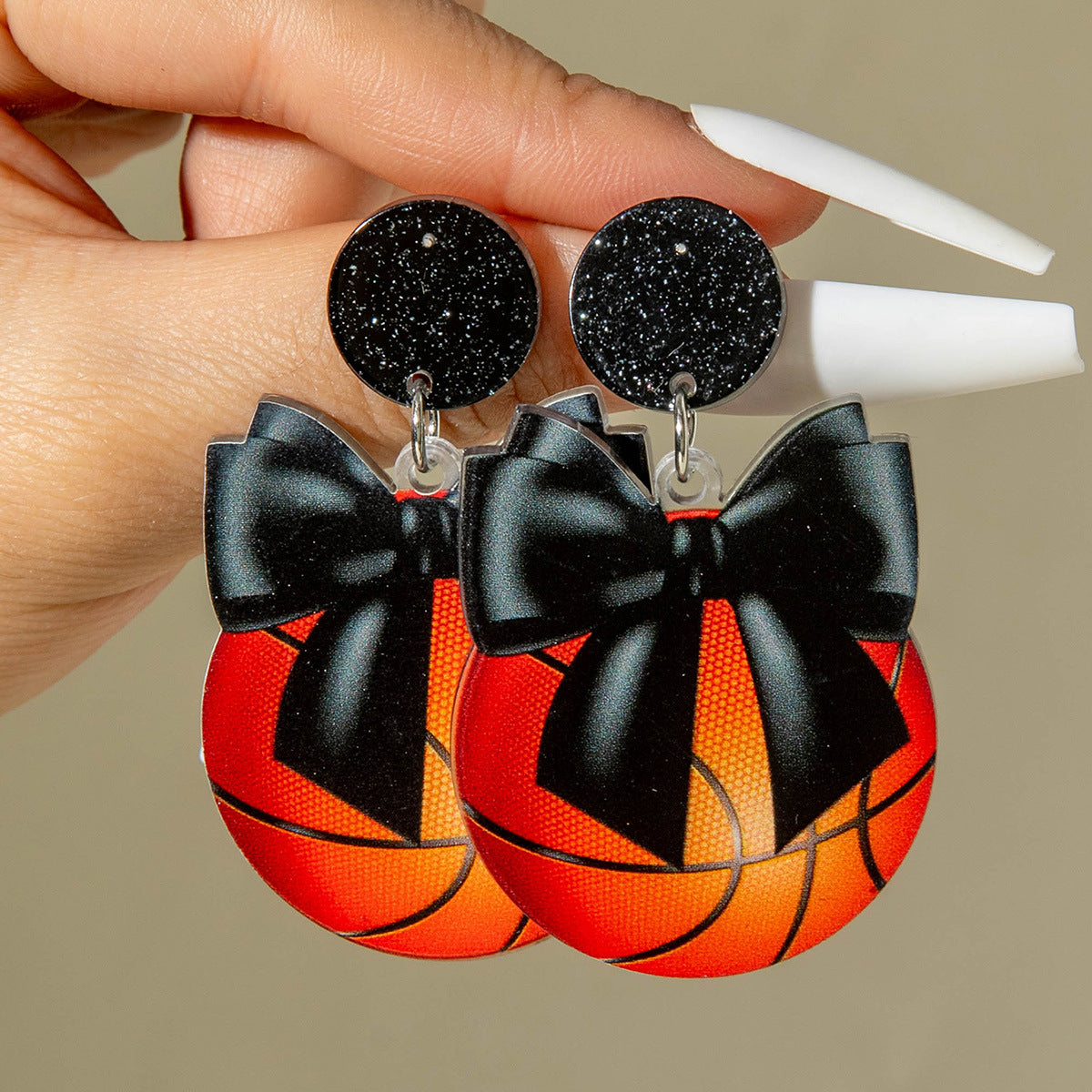 Wholesale Sporty soccer leopard print bow earrings