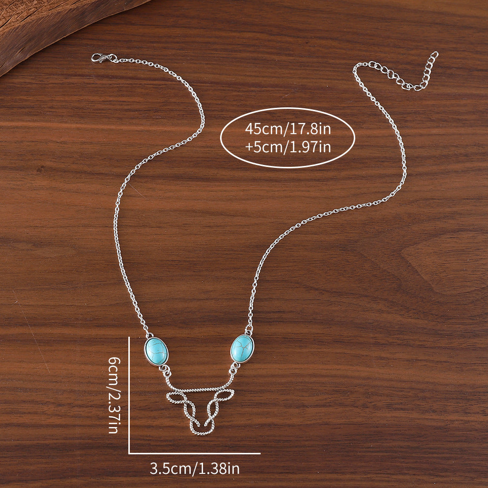 Wholesale inlaid turquoise cow head necklace Bohemian hollow  jewelry