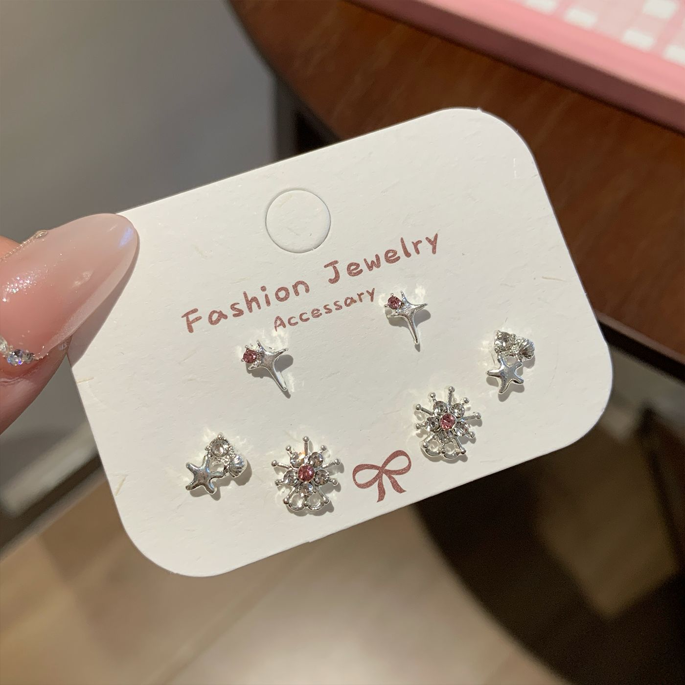 Wholesale Sweet and cool pink zircon butterfly earrings silver needle small daily sparkling all-match earrings