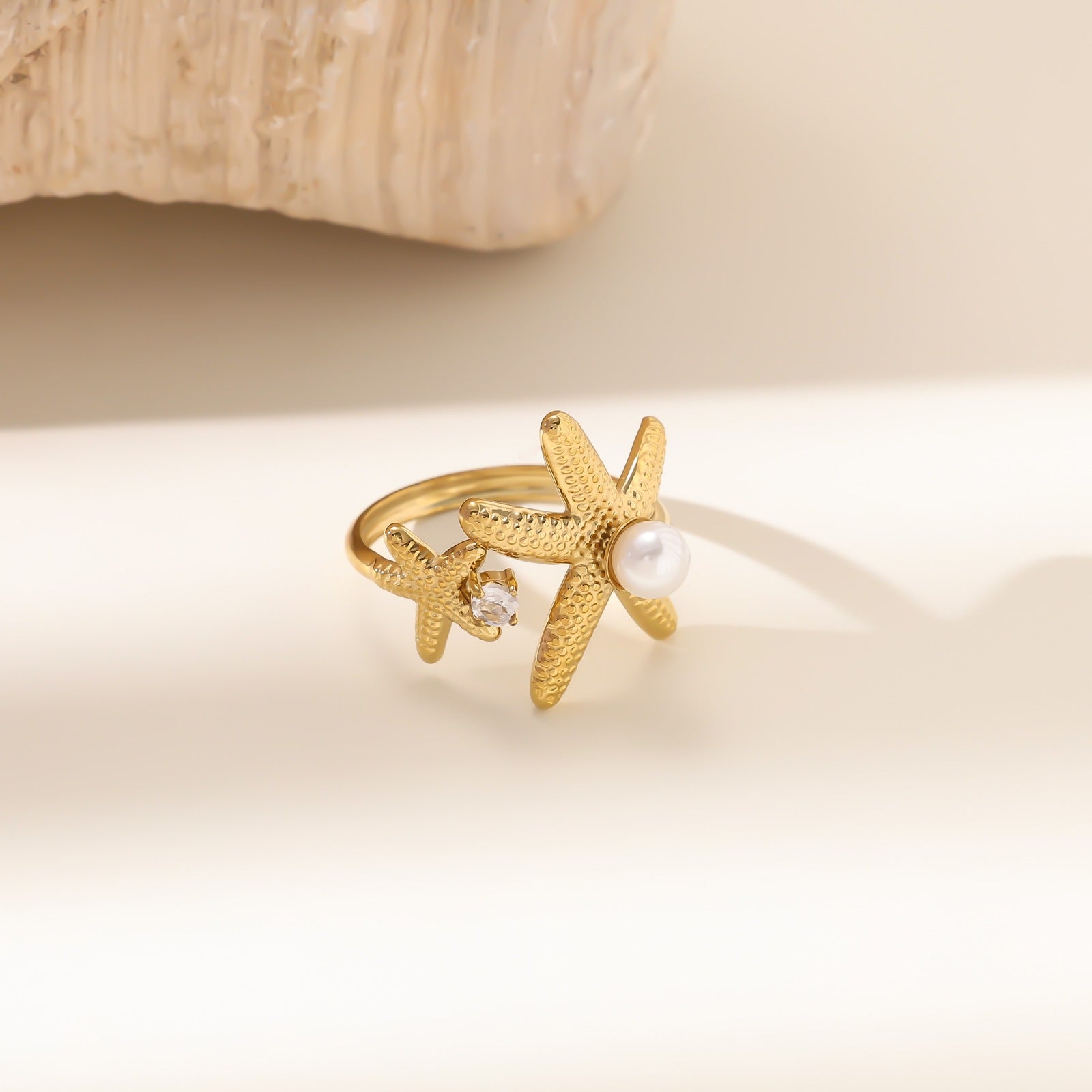 Wholesale Stainless steel gold-plated adjustable starfish flower ring