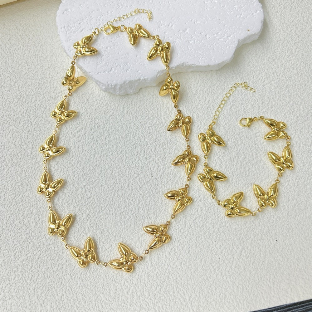 Wholesale  stainless steel three-dimensional hollow butterfly bracelet necklace suit