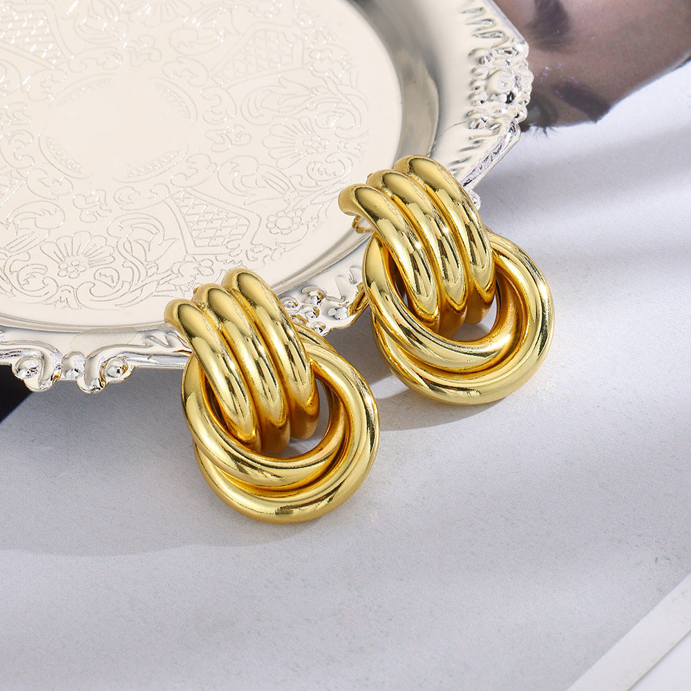 Wholesale geometric exaggerated smooth hollow tube winding earrings