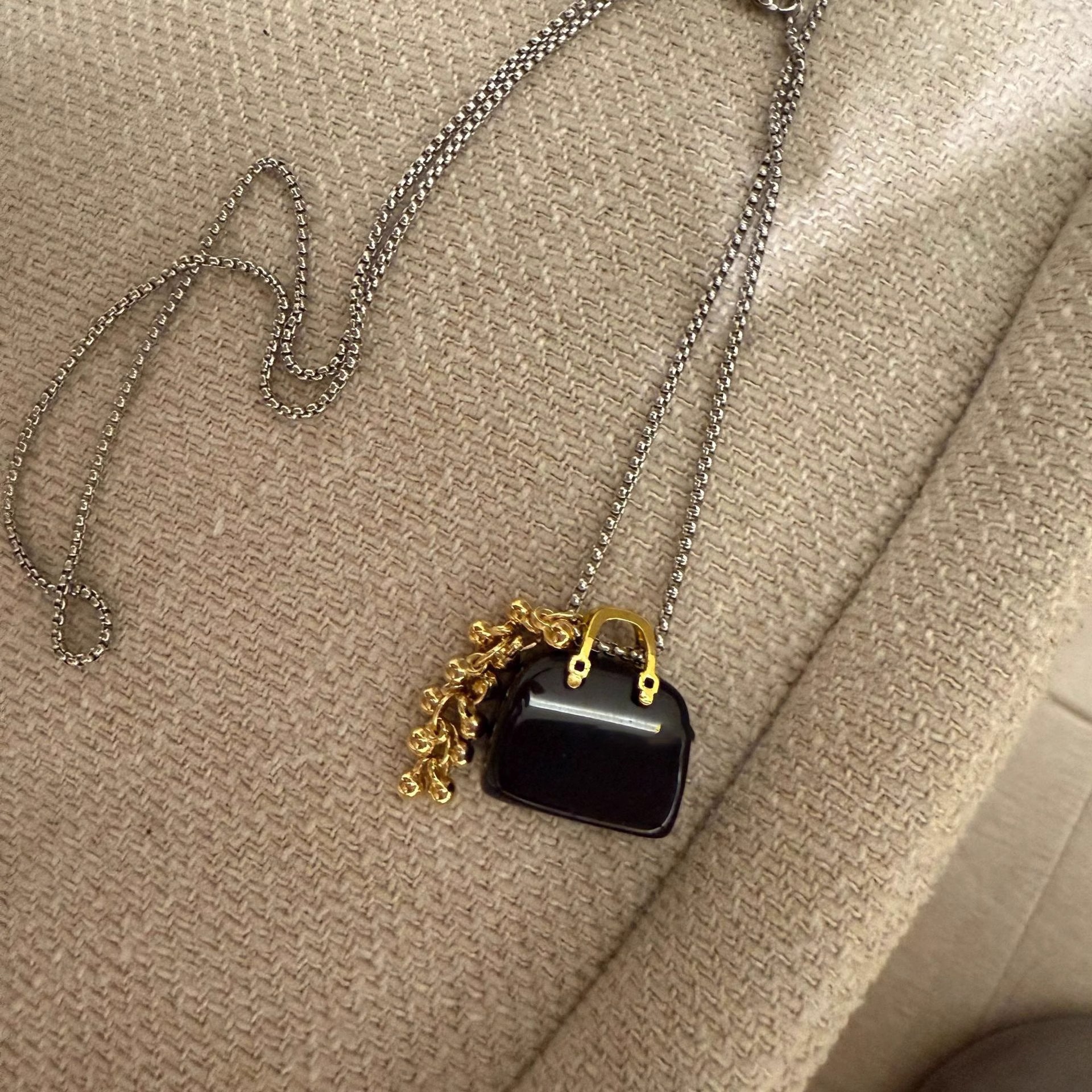 Wholesale Titanium Steel Natural tiger eye stone bag grape string pendant necklace