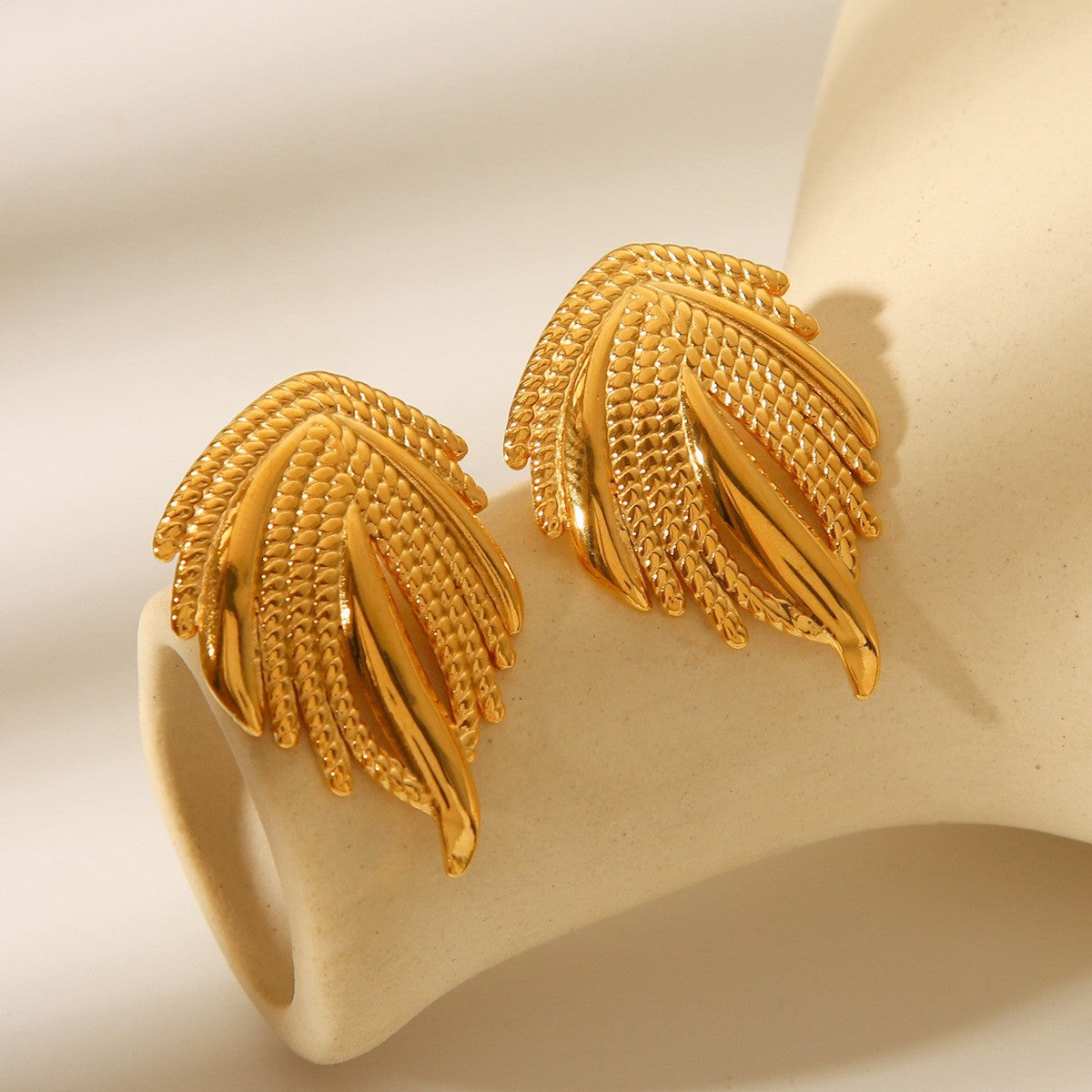Wholesale Trendy Gold Tone Stainless Steel Statement Earrings Featuring Wing Ball Conch Design For Party Jewelry Accessory