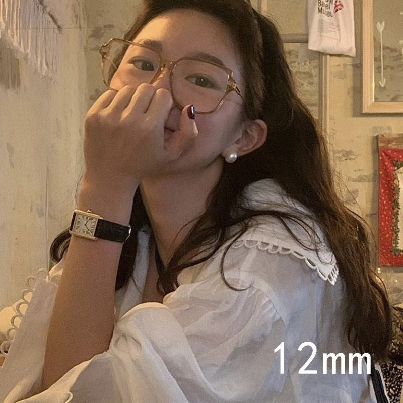 Wholesale big round pearl hollow mosquito coil ear clip earrings