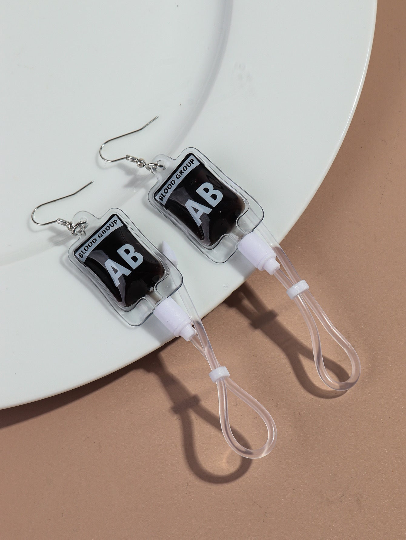 Wholesale creative plasma blood bag earrings