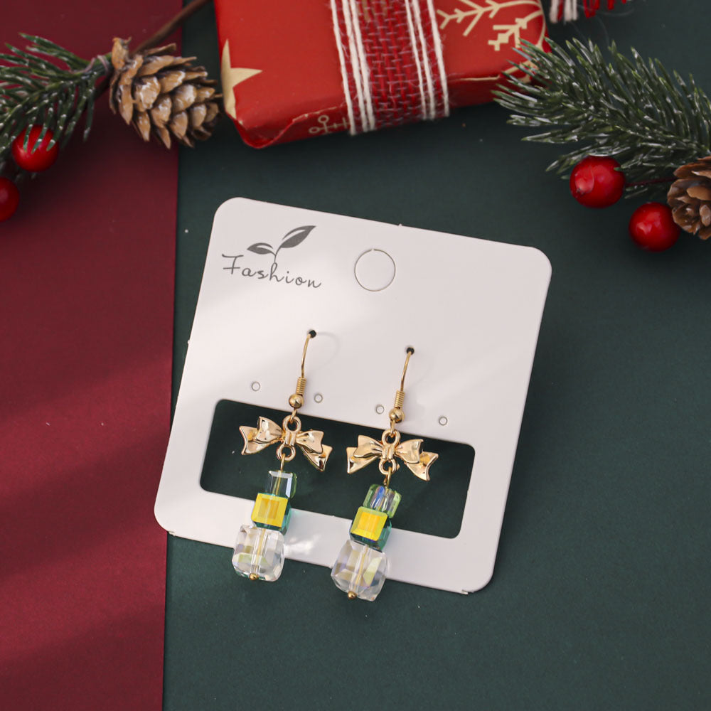 Orecchini in cristallo con stella e fiocco all'ingrosso